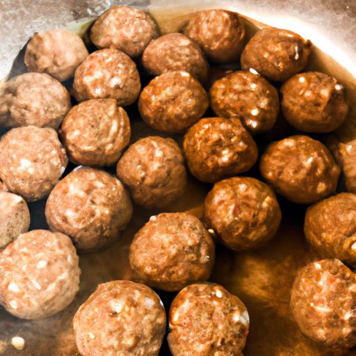 Homemade meatballs ready to be added to the wedding soup, seasoned with herbs and spices.